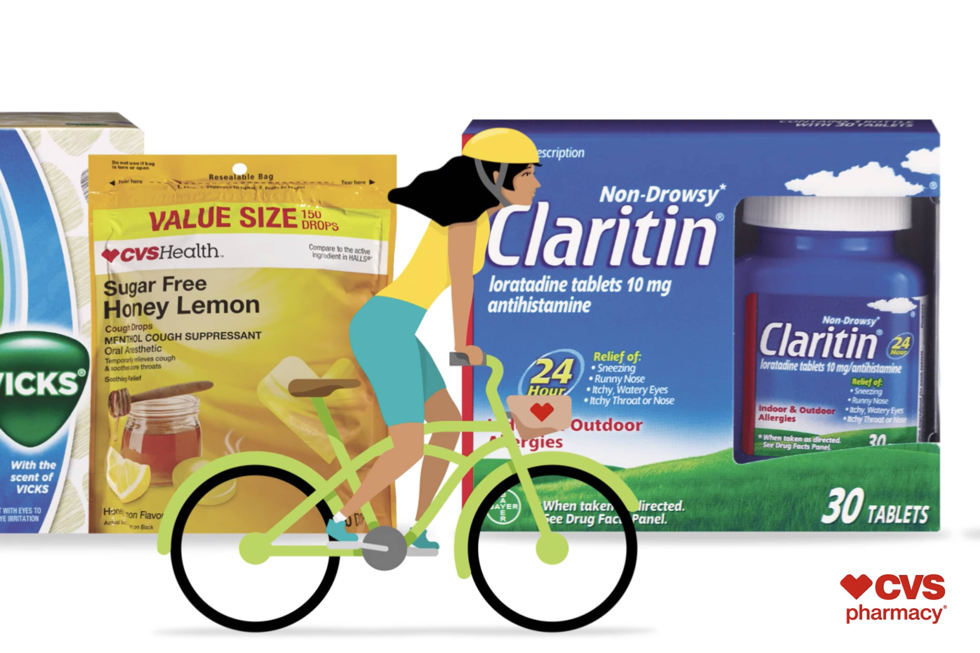 A woman on a bicycle rides past several allergy products, including Puffs tissues with Vick's, CVS Health honey lemon cough drops, and Claritin.